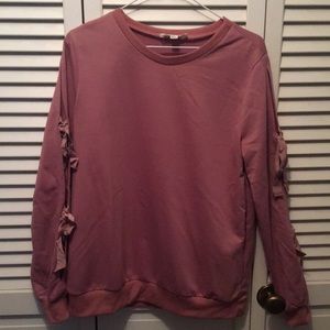 Overstitched sweatshirt style top.